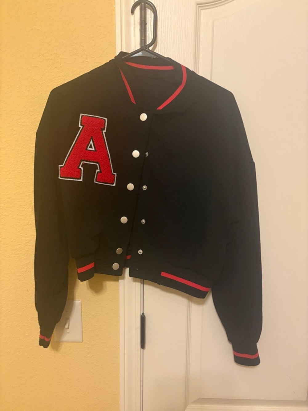 Black Letterman Jacket with Red 'A' Patch